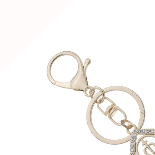 Chaveiro de Nossa Senhora Aparecida Gota com Strass e Mosquete em Metal - Dourado